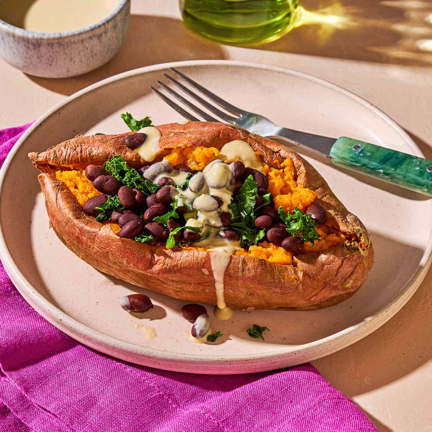 Cover image of “Stuffed Sweet Potato with Hummus Dressing”