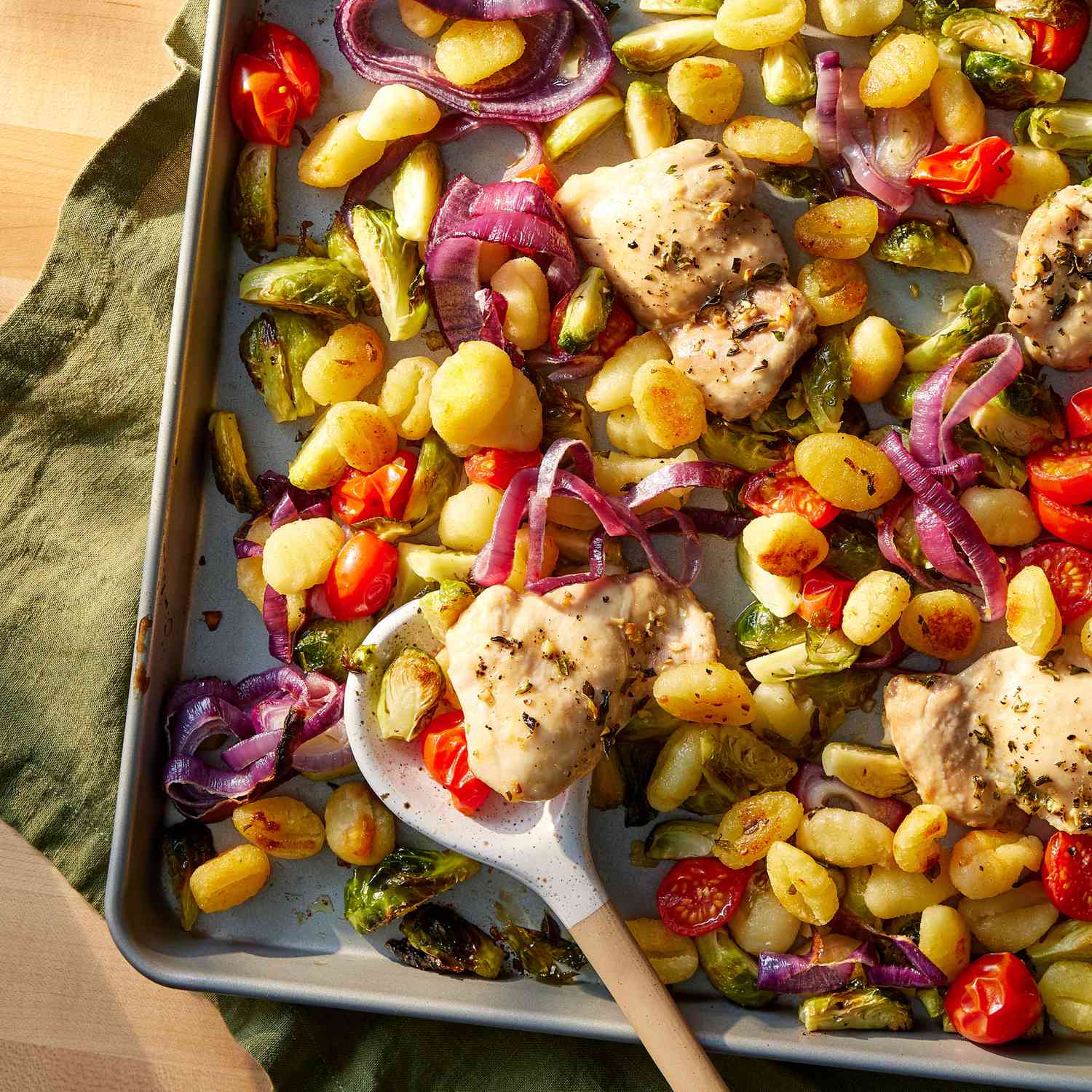 Cover image of “Sheet-Pan Chicken Thighs with Brussels Sprouts & Gnocchi”